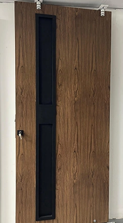 A wood-tone door with a narrow inset vertical glass panel.
